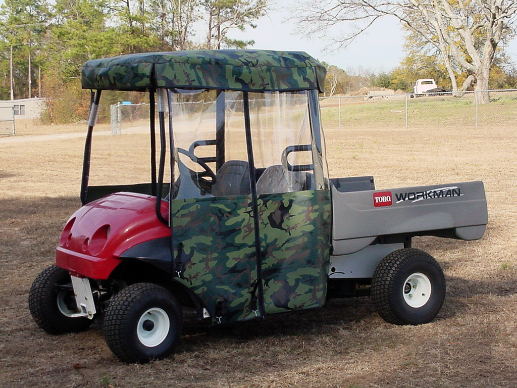 Tobo Workman utility vehicle with camo cover